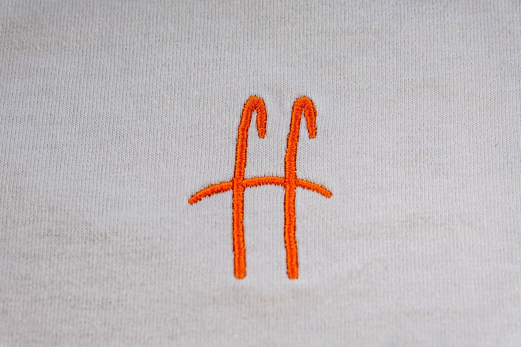 Embroidered Neck Logo Tee